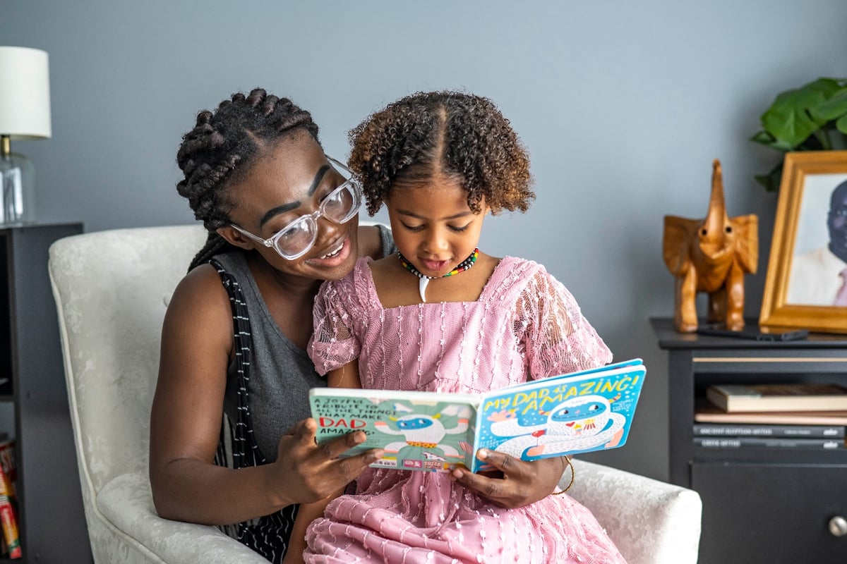 Homeowner reading to her daughter.