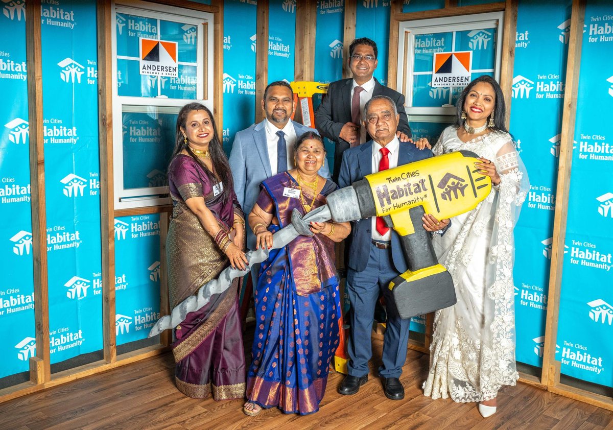 Family posing at a photo booth.