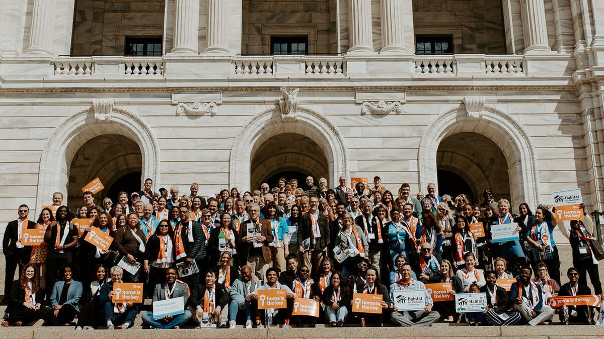 2024 Habitat on the Hill group photo on the Capitol steps.