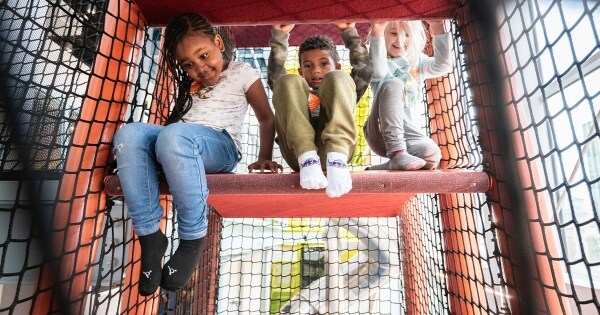 Kids playing at the museum.